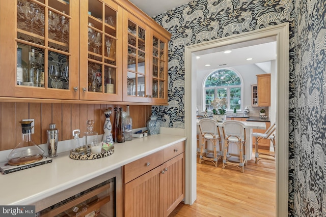 10 Callery Way, Malvern, PA 19355 - indoor dry bar featuring wallpapered walls, light wood-type flooring, and wine cooler