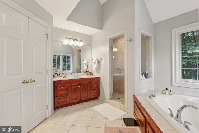 10 Callery Way, Malvern, PA 19355 - bathroom with vanity, a stall shower, a jetted tub, tile patterned flooring, and vaulted ceiling