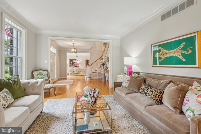 10 Callery Way, Malvern, PA 19355 - living area with wood finished floors, stairs, and ornamental molding