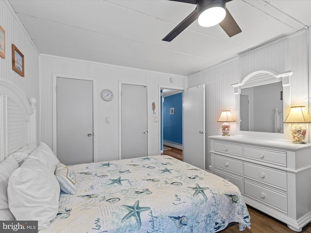 2701 Sparrow Ln Unit 1, Ocean City, MD 21842 - bedroom with crown molding, dark wood finished floors, and a ceiling fan