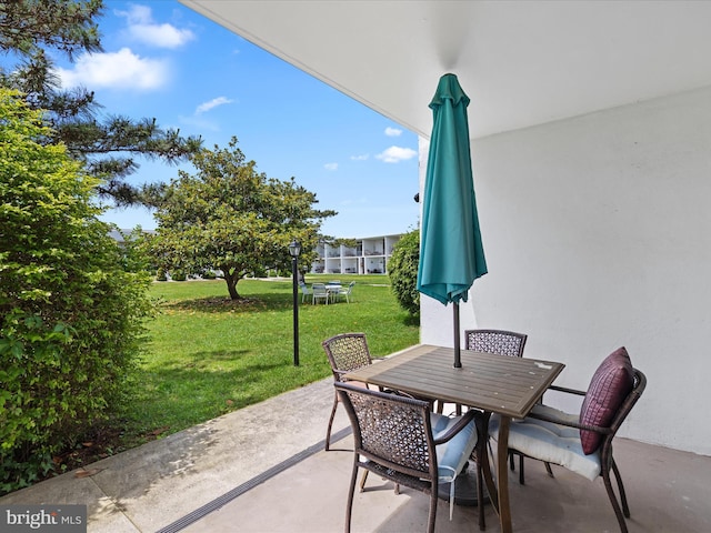 2701 Sparrow Ln Unit 1, Ocean City, MD 21842 - view of patio / terrace featuring outdoor dining area