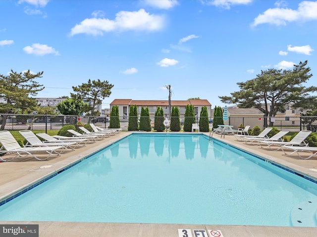 2701 Sparrow Ln Unit 1, Ocean City, MD 21842 - community pool featuring a patio area