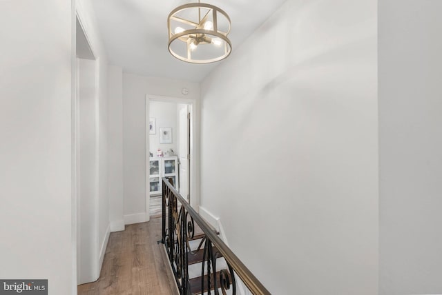 2229 S Darien St, Philadelphia, PA 19148 - hallway featuring an upstairs landing, a chandelier, and light wood-style floors