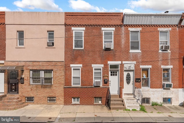 2229 S Darien St, Philadelphia, PA 19148 - townhome / multi-family property featuring entry steps, brick siding, and cooling unit