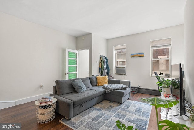 2229 S Darien St, Philadelphia, PA 19148 - living area with wood finished floors, a baseboard radiator, and cooling unit