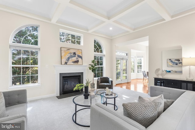 4509 Rhett Ln, Fairfax, VA 22030 - living area with coffered ceiling, a fireplace with flush hearth, beam ceiling, and crown molding