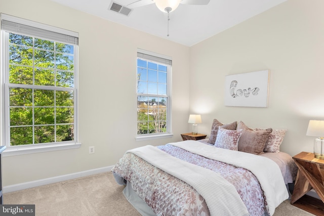 4509 Rhett Ln, Fairfax, VA 22030 - carpeted bedroom with multiple windows and a ceiling fan