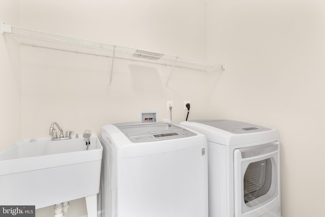 4509 Rhett Ln, Fairfax, VA 22030 - washroom featuring washing machine and clothes dryer