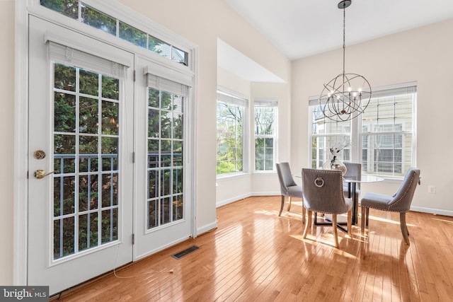 4509 Rhett Ln, Fairfax, VA 22030 - dining room featuring a chandelier and hardwood / wood-style floors