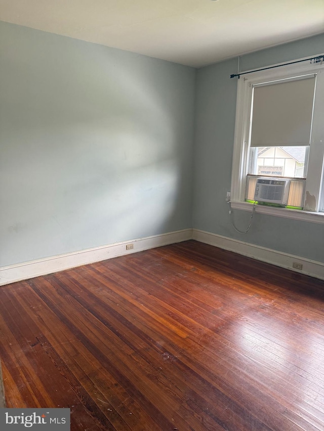 516 N 25th St, Reading, PA 19606 - spare room with hardwood / wood-style flooring and cooling unit