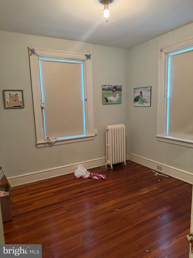 516 N 25th St, Reading, PA 19606 - unfurnished room featuring radiator and hardwood / wood-style flooring