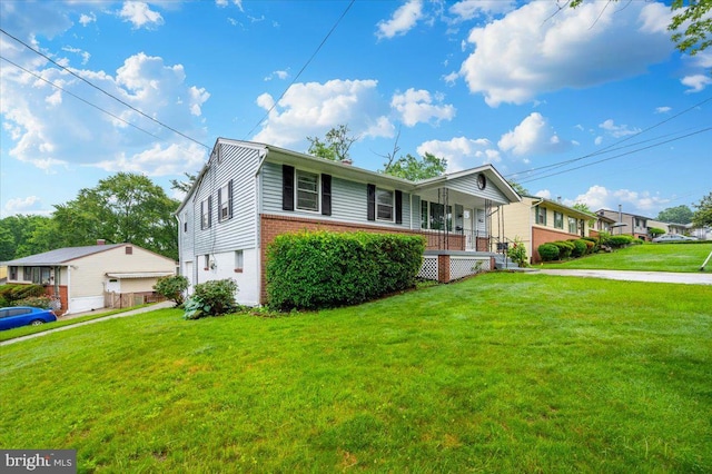 7533 Dover Ln, Lanham, MD 20706 - ranch-style house with brick siding, a porch, and a front lawn