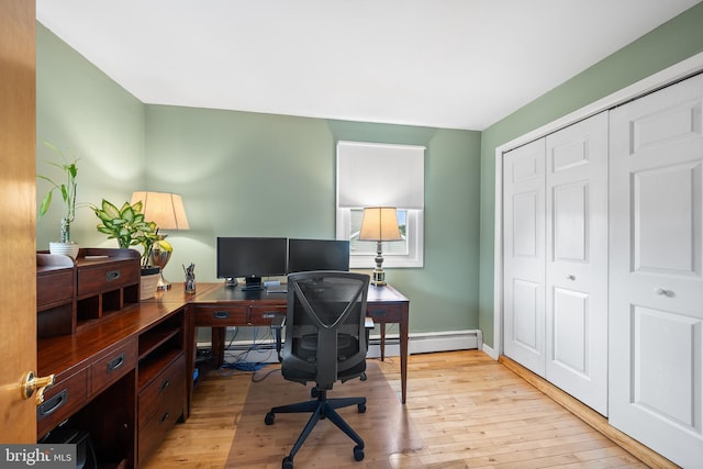 532 Wicker Ave, Bensalem, PA 19020 - office with a baseboard heating unit and light wood-style floors