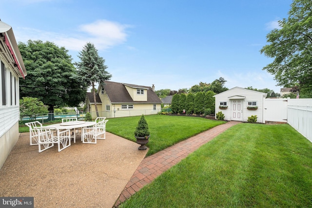 532 Wicker Ave, Bensalem, PA 19020 - fenced backyard featuring an outbuilding, a patio area, and outdoor dining space