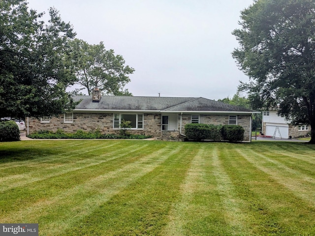 2992 Normandy Dr, Ellicott City, MD 21043 - view of front of property featuring a front yard, a chimney, and stone siding