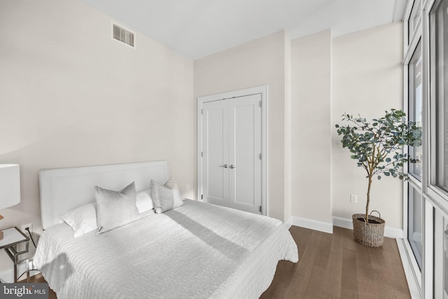 1330 Lancaster St Unit C601, Baltimore, MD 21231 - bedroom featuring wood finished floors and baseboards