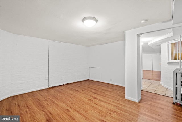 2637 Garfield St NW, Washington, DC 20008 - empty room with light wood-style floors and a smoke detector