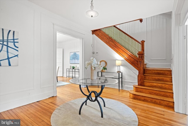 2637 Garfield St NW, Washington, DC 20008 - entryway featuring hardwood / wood-style floors, stairs, and a decorative wall