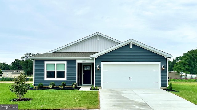 1329 Fairview Ln, Salisbury, MD 21801 - view of front of property with a front lawn, driveway, an attached garage, and a shingled roof