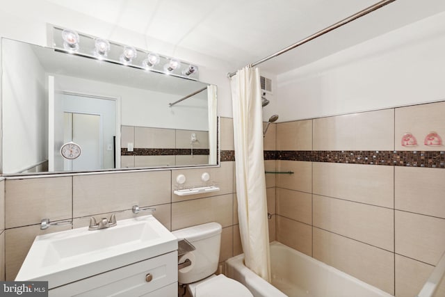 2101 Chestnut St Unit 909, Philadelphia, PA 19103 - bathroom featuring shower / tub combo, tile walls, and vanity