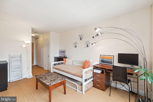 2101 Chestnut St Unit 909, Philadelphia, PA 19103 - bedroom featuring light wood finished floors and an office area