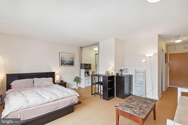 2101 Chestnut St Unit 909, Philadelphia, PA 19103 - bedroom with wood finished floors