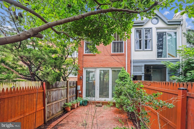 423 5th St SE, Washington, DC 20003 - rear view of property featuring a patio area and stucco siding