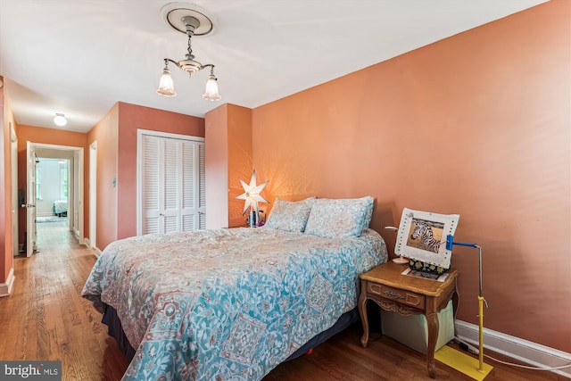 423 5th St SE, Washington, DC 20003 - bedroom featuring a chandelier, wood finished floors, and a closet