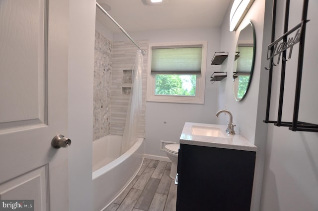 207 Maryland Ave, Newport, DE 19804 - full bathroom featuring vanity, shower / bath combination with curtain, and wood finished floors