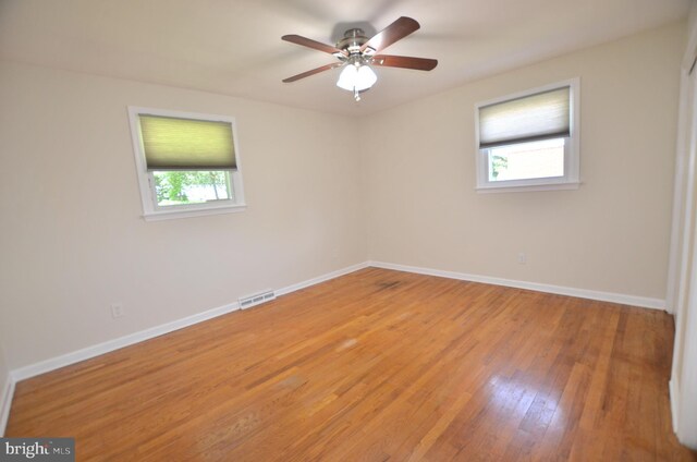 207 Maryland Ave, Newport, DE 19804 - empty room with light wood-style flooring and a ceiling fan