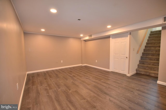 207 Maryland Ave, Newport, DE 19804 - finished basement featuring dark wood-style flooring, stairway, recessed lighting, and crown molding