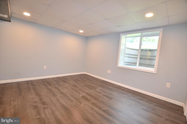207 Maryland Ave, Newport, DE 19804 - empty room featuring a paneled ceiling, dark wood-style flooring, and recessed lighting