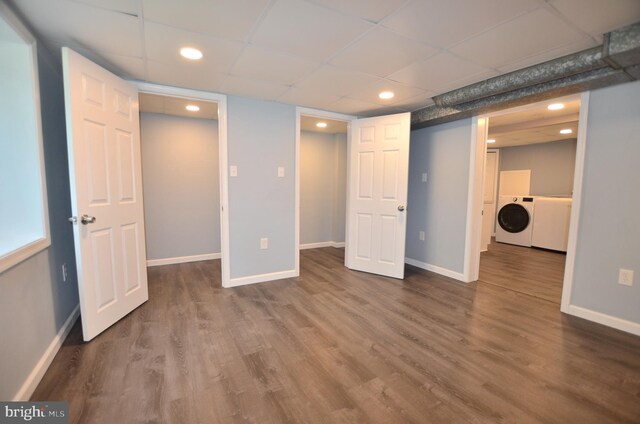 207 Maryland Ave, Newport, DE 19804 - finished below grade area with washer and dryer, a paneled ceiling, recessed lighting, and wood finished floors