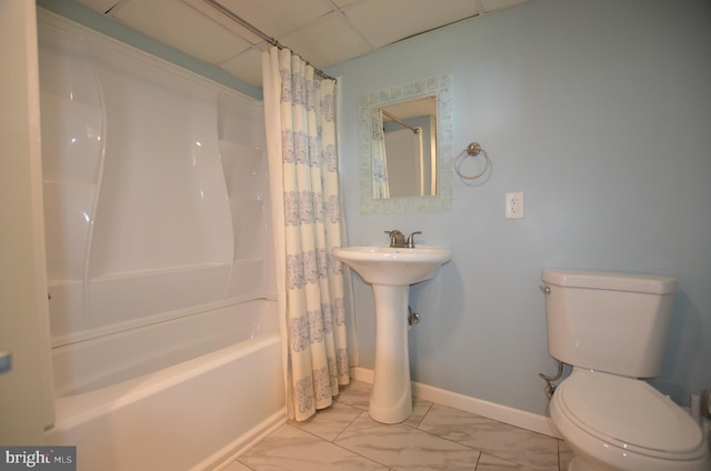 207 Maryland Ave, Newport, DE 19804 - full bath with shower / tub combo with curtain, marble finish flooring, and a drop ceiling