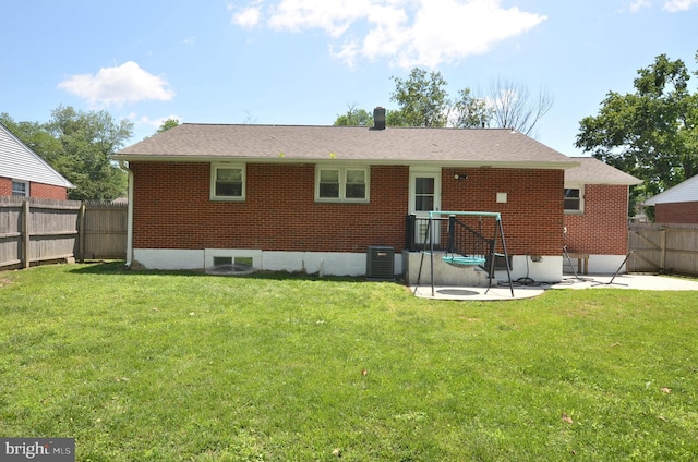 207 Maryland Ave, Newport, DE 19804 - rear view of house with brick siding, a patio, and a shingled roof