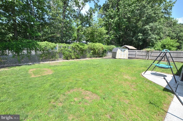 207 Maryland Ave, Newport, DE 19804 - fenced backyard featuring a shed