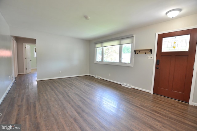 207 Maryland Ave, Newport, DE 19804 - entryway featuring dark wood-style flooring and baseboards