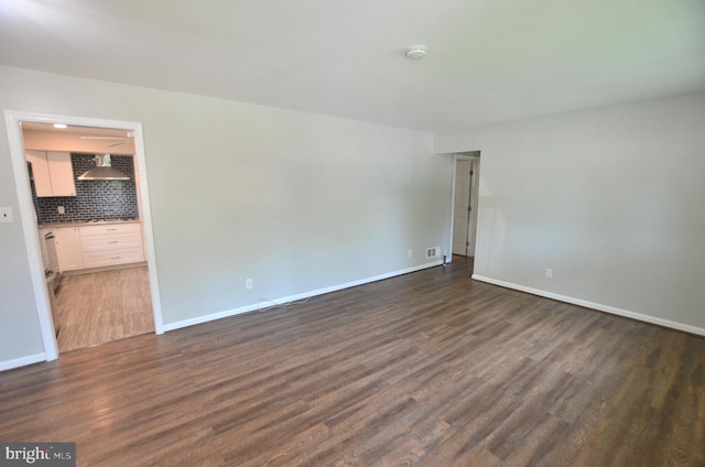 207 Maryland Ave, Newport, DE 19804 - unfurnished room with dark wood-style floors and a smoke detector