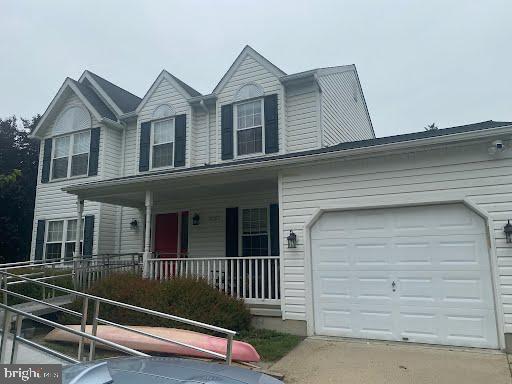 3106 Birch Brook Ln, Abingdon, MD 21009 - traditional-style house featuring a porch and driveway