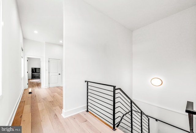 1922 1st St NW Unit B, Washington, DC 20001 - hall featuring an upstairs landing, light wood finished floors, and recessed lighting