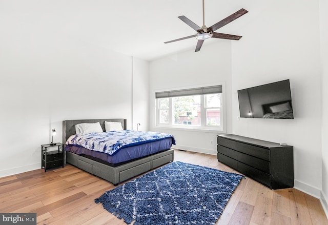 1922 1st St NW Unit B, Washington, DC 20001 - bedroom with wood finished floors, a ceiling fan, and high vaulted ceiling