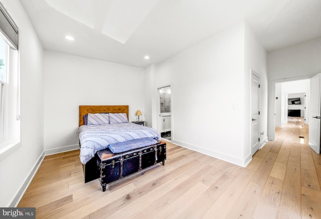 1922 1st St NW Unit B, Washington, DC 20001 - bedroom featuring light wood finished floors, recessed lighting, and ensuite bath