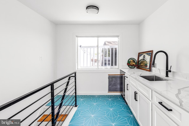 1922 1st St NW Unit B, Washington, DC 20001 - washroom with a sink and baseboards