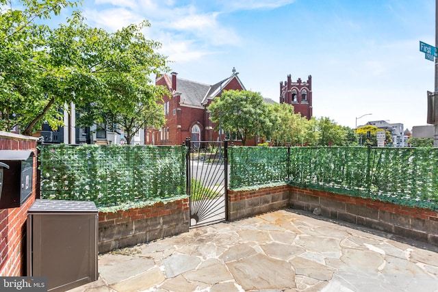 1922 1st St NW Unit B, Washington, DC 20001 - view of patio featuring a gate