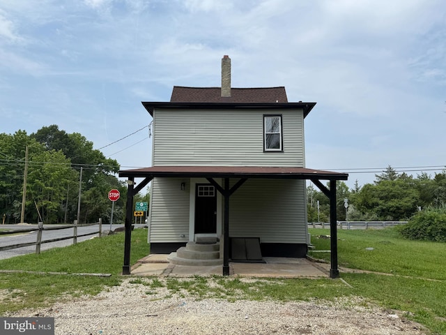 2 Schooner Landing Rd, Millville, NJ 08332 - back of house featuring a chimney and entry steps