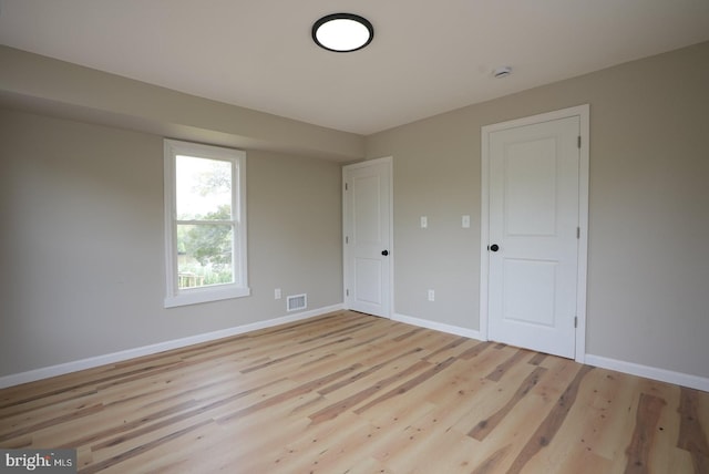 2 Schooner Landing Rd, Millville, NJ 08332 - unfurnished bedroom with light wood-style floors and baseboards