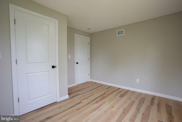 2 Schooner Landing Rd, Millville, NJ 08332 - unfurnished bedroom with light wood-style floors and baseboards