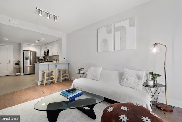 50 Florida Ave NE Unit 404, Washington, DC 20002 - living room featuring light wood-style floors and recessed lighting