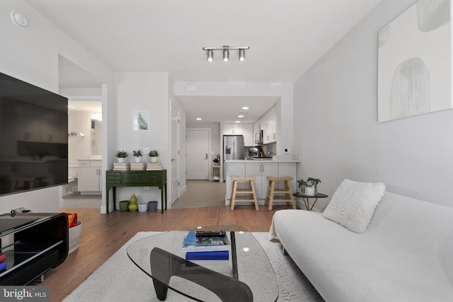 50 Florida Ave NE Unit 404, Washington, DC 20002 - living room featuring wood finished floors and recessed lighting