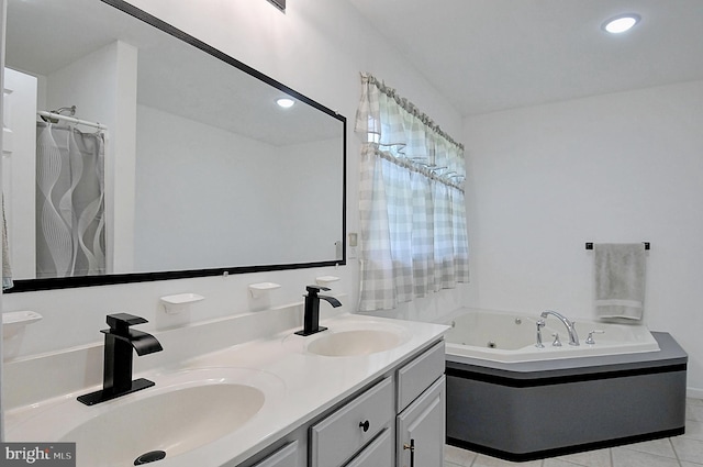 121 Sweetbriar Ln, Winchester, VA 22603 - full bathroom with a jetted tub, double vanity, tile patterned flooring, and recessed lighting